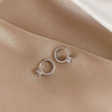 Elegant Golden Micro-inlaid Four-claw Round Earrings